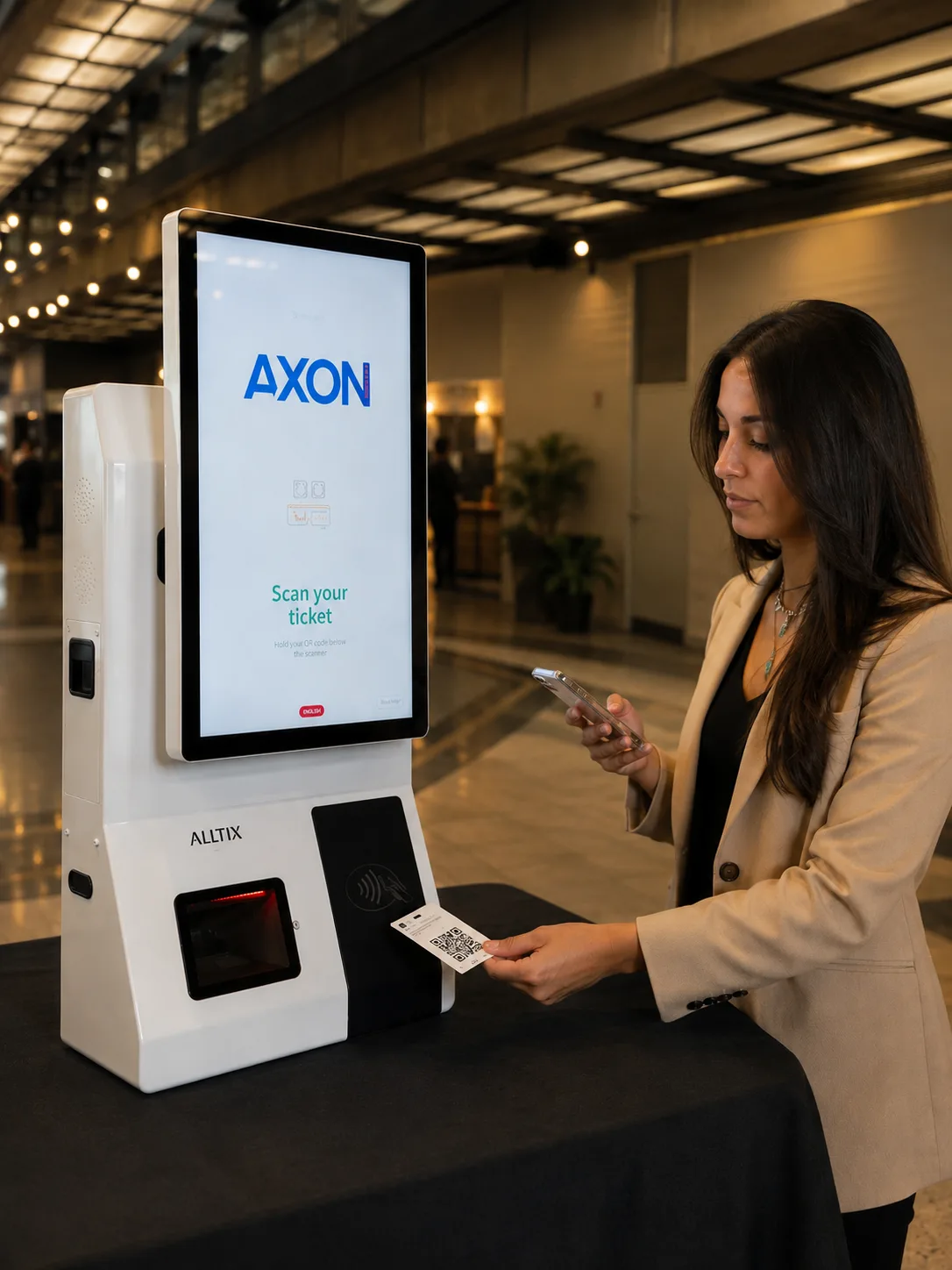 A guest holding a printed ticket up to the contactless reader on an Alltix kiosk.